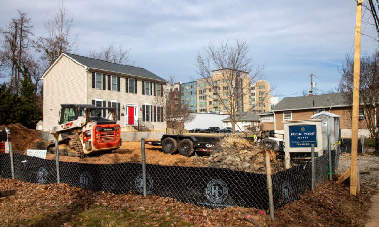 Photo of land being cleared for a single-family home.