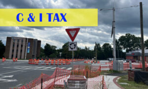 Maple and Annandale roundabout in construction with C&I Tax banner