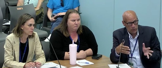 Photo of the GOL public works team explaining the cost estimate.