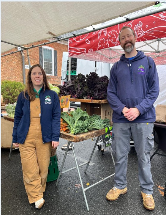 Market Manager Jennifer Brady and maintenance staff Liam Andrews.